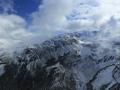 WEST SIDE MOUNT RAINIER -- "THROUGH THE CLOUDS" - HELICOPTER