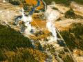 CASTLE GEYSER-YELLOWSTONE PARK ERUPTING AERIAL