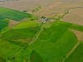 THIS AERIAL SHOT SHOWS THE DIFFERENCE, BETWEEN IRRIGATED AND NON IRRIGATED LAND, ACROSS THE ROAD FROM EACH OTHER-THE GREATEST MIGRATION IN HISTORY WILL COME WHEN THE GREAT QUAKES RUPTURE AMERICAS AQUIFERS -  COPYRIGHT STEVE QUAYLE