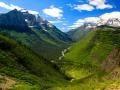 GLACIER PARK LOOKING SOUTH-THE RIVER IS THE MOST BEAUTIFUL SHADE OF GREEN AND AQUAMARINE