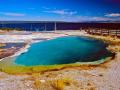 WEST THUMB GEYSER BASIN WITH YELLOWSTONE LAKE IN THE BACKGROUND