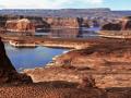 "LAKE POWELL", THE WATER LEVEL IS SO LOW THAT BOATS HAVE TO FOLLOW CHANNEL MARKERS ON THE LAKE - COPYRIGHT-STEVE QUAYLE