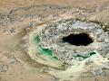 YELLOWSTONE: UNUSUAL GEYSER VENT WITH THE GREEN THERMOPHILE BACTERIA THAT I HAVE NEVER SEEN OR FILMED BEFORE - COPYRIGHT STEVE QUAYLE