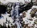 SPRING WATERFALLS IN THE GRAND TETON MOUNTAINS, WYOMING - FINALLY SPRING MELT IS UNDER WAY IN THE HIGH COUNTRY-AERIAL