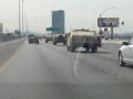 Hi Steve I just attached a picture of military vehicles that where unmarked, except for the words Military Police.  My photo shows about three of them but this is the end of a line of eleven military trucks! This is on the 15 South in Las Vegas, NV